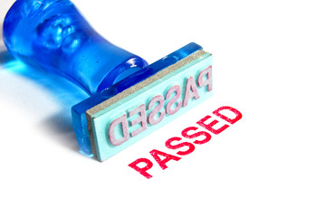 passed blue rubber stamp