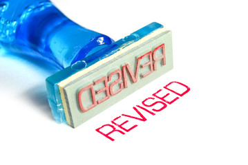 revised blue rubber stamp