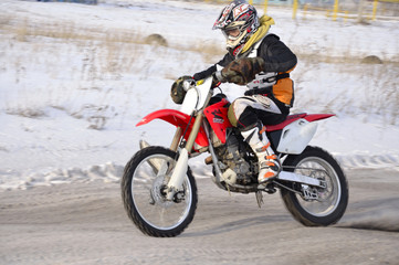 Obraz na płótnie Canvas Russia, Samara, motocross rider turn