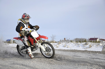Fototapeta na wymiar Russia, Samara, motocross rider turn