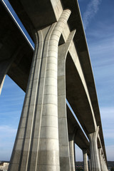 high and long concrete bridge across the valley