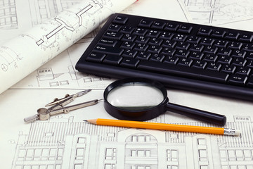 construction drafts and tools on the table