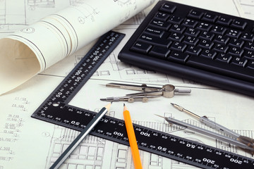 construction drafts and tools on the table