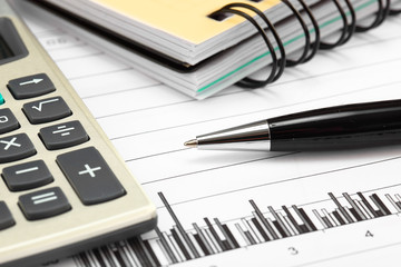 financial charts and graphs on the table