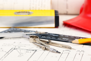 construction drafts and tools on the table