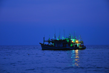 Fototapeta na wymiar Fishing boats at night