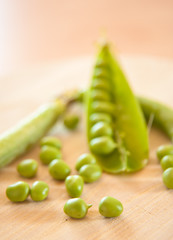 peas on wooden deck
