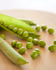 peas on wooden deck