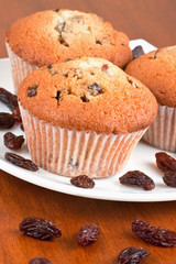 Muffins on a white plate