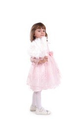 four-year girl in a beautiful pink dress with a fan.