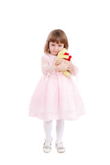 four-year girl in a beautiful pink dress   isolated