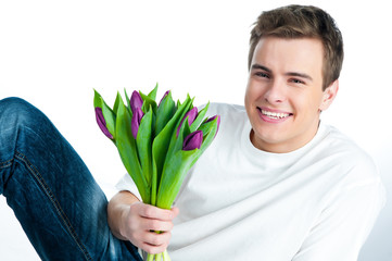 man with a bouquet of tulips