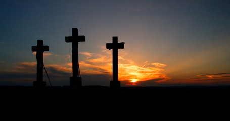 Three crosses on sunset.