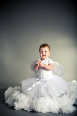 little beautiful girl like angel in the sky