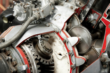 precision mechanics inside a propeller aircraft engine