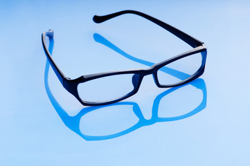 Optical reading glasses on the background