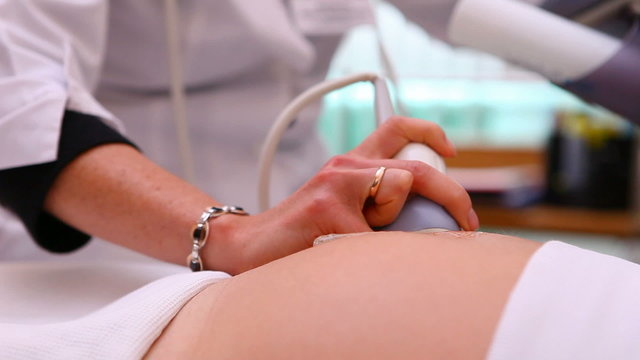 pregnant girl doing an ultrasound