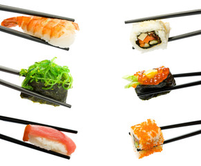 Sushi with chopsticks isolated over white background - 29968025