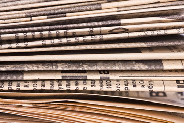 Old russian newspapers on the white