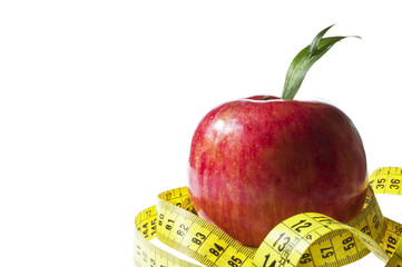 Apple and a measure tape - diet concept -