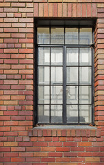 Brick wall black rimmed window