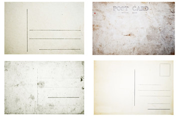 Collection of various grunge empty postcards isolated on white