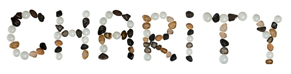 Charity word made of sand stones