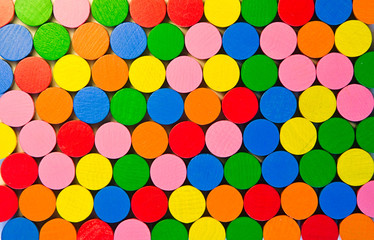 Colourful round wooden tokens