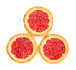 Three cookies with jam on white background
