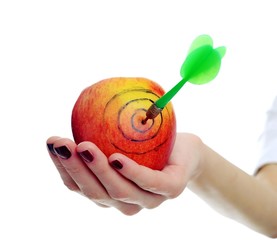 Red apple with dart