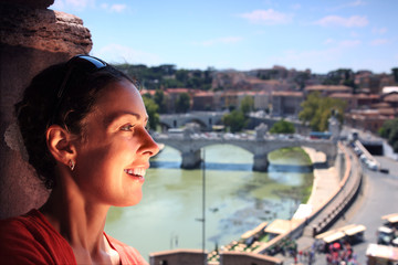 Young beautiful woman near window in Sant' Angelo Castel.