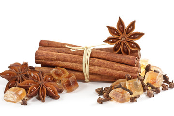 Star anise, cinnamon sticks, brown sugar and cloves.