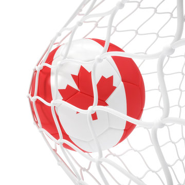 Canadian soccer ball inside the net