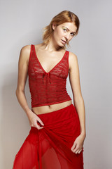 Redhead beauty in studio