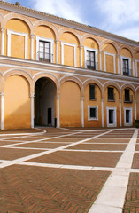 Fototapeta na wymiar Courtyard at the Real Alcazar Moorish Palace in Seville