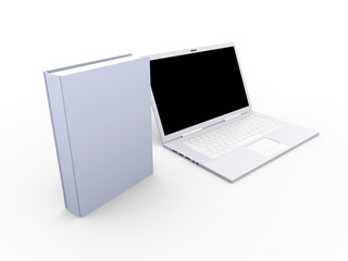 Laptop mit Buch