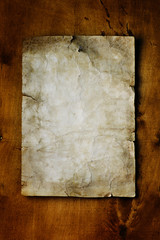 old paper on brown wood