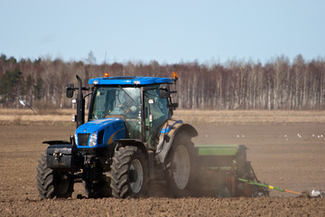 Fototapeta premium Tractor in the field