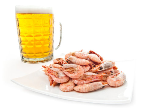 Beer in glass and prawns