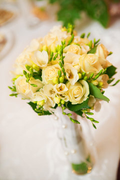 Yellow wedding bouquet on a table