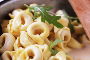 Tortellini and cream sauce