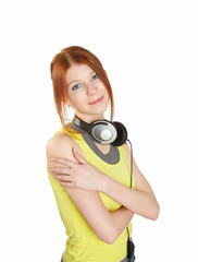 Fototapeta premium a teenage girl in studio with headphones