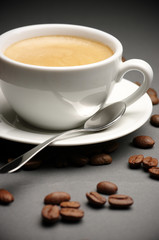 Cup of coffee and coffee beans