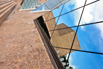 modern building with pyramides and reflection
