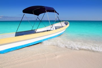 Fototapeta na wymiar boat tropical beach Caribbean turquoise sea