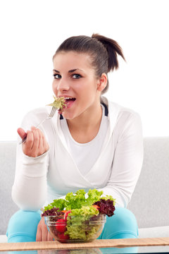 teenager eating salad