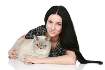Attractive woman with a cat on a white background