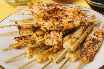 Grilled chicken and baby corn skewer