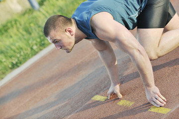 young athlete on start