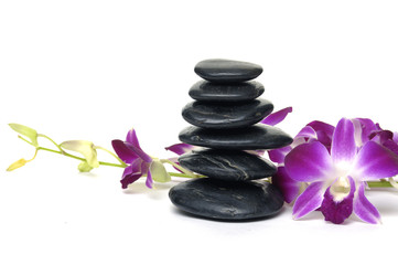 Spa essentials-orchid with pyramid of stones